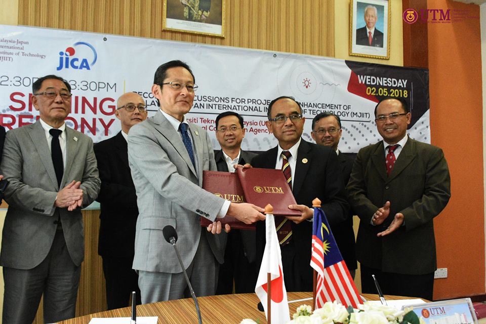 Signing ceremony Records of Discussions between UTM and JICA